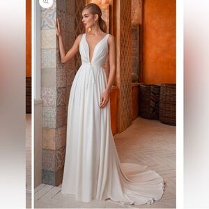 Innocentia Elegant V-Neck White Bridal Gown with Flowing Train